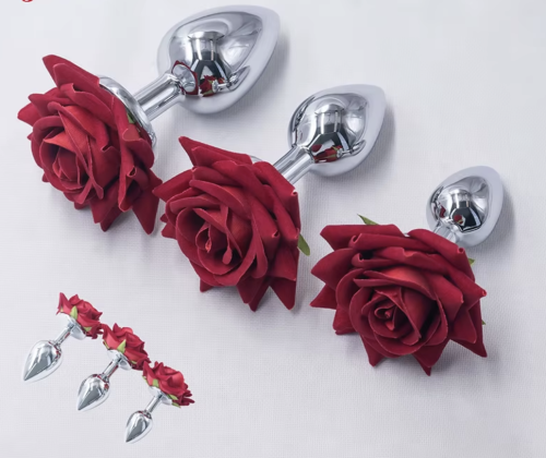 Korek analny z ozdobnym kwiatem w rozmiarach S, M i L. Elegancki metalowy plug z bezpieczną podstawą i dokładnymi wymiarami. Idealny dla początkujących i zaawansowanych.